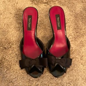 Black open toe slip on heel with cute bow detail.